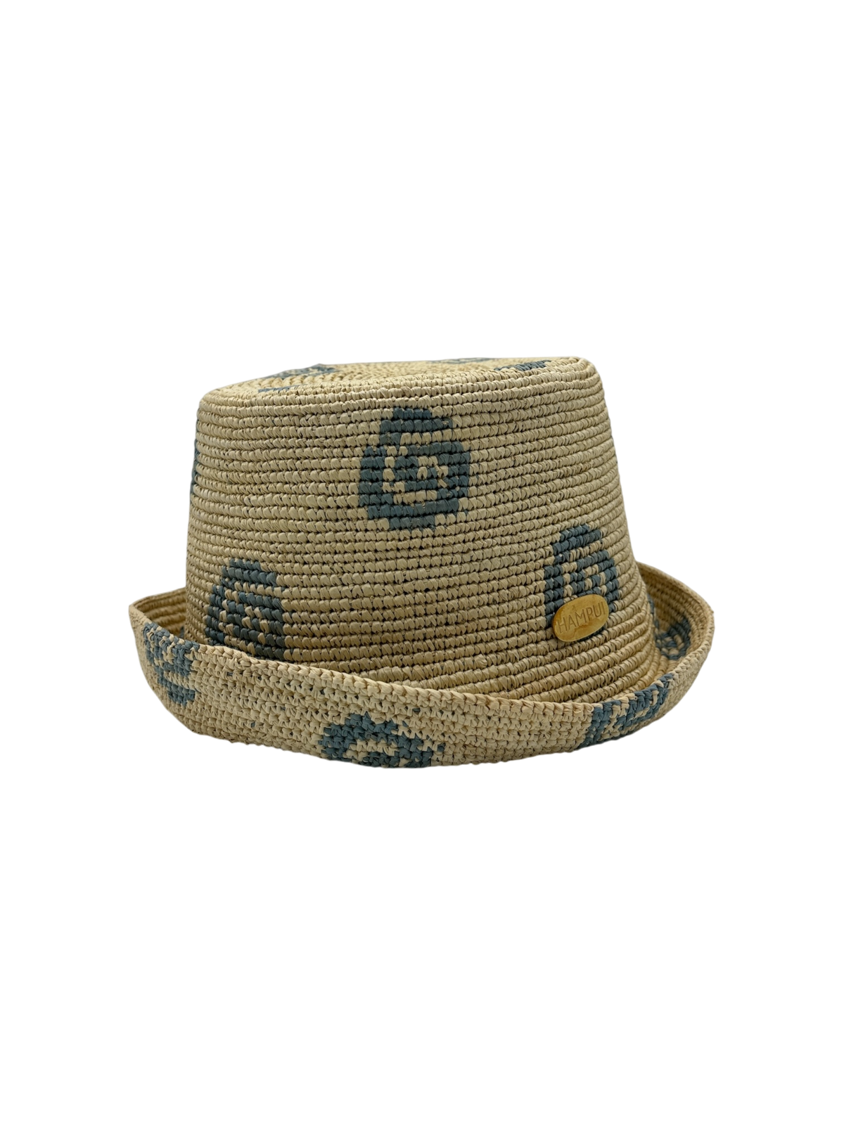 Caracola straw bucket shown with the brim rolled up to a tall kufi profile.