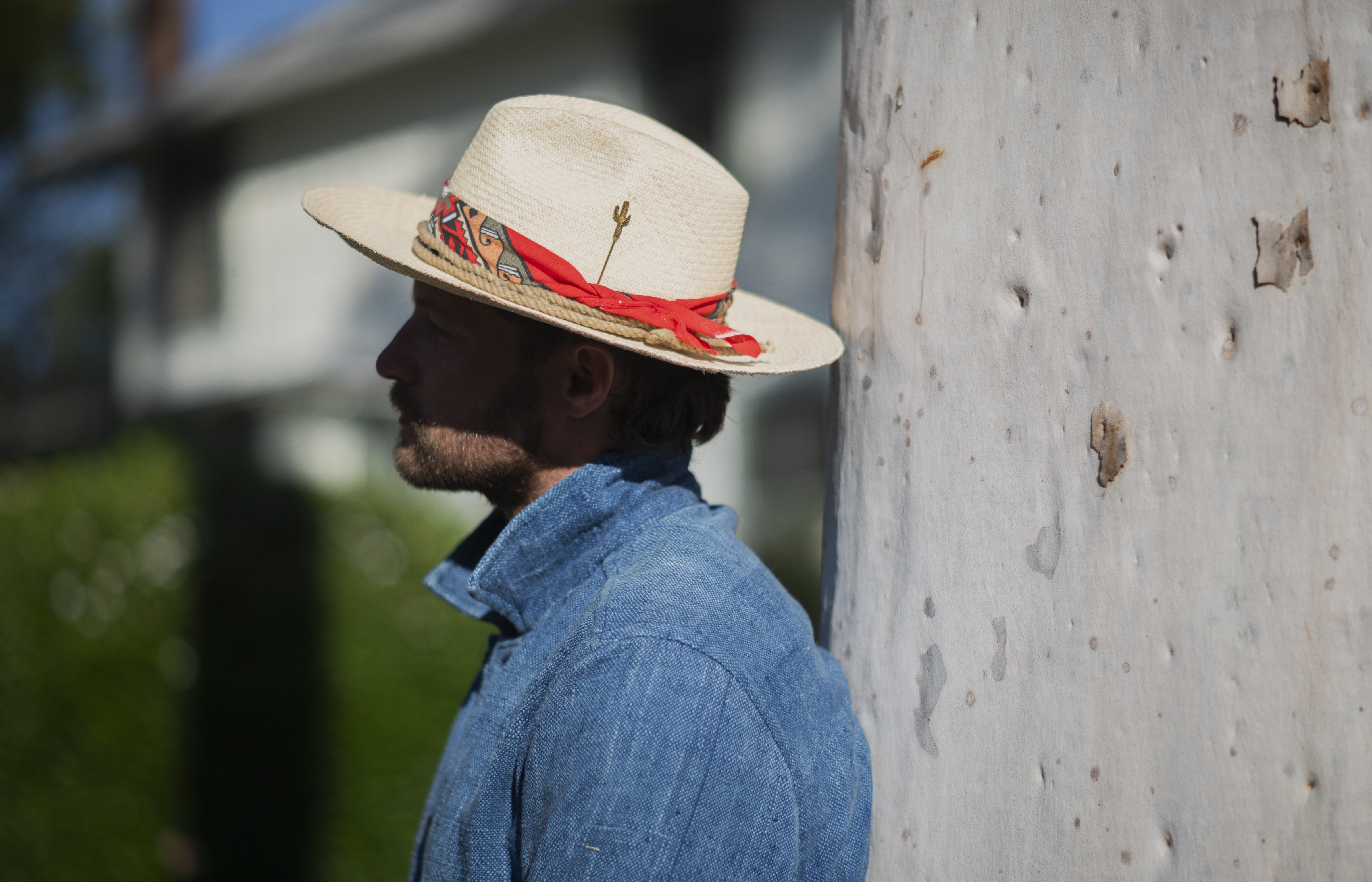 Firebird hat styled outdoors, lifestyle setting.