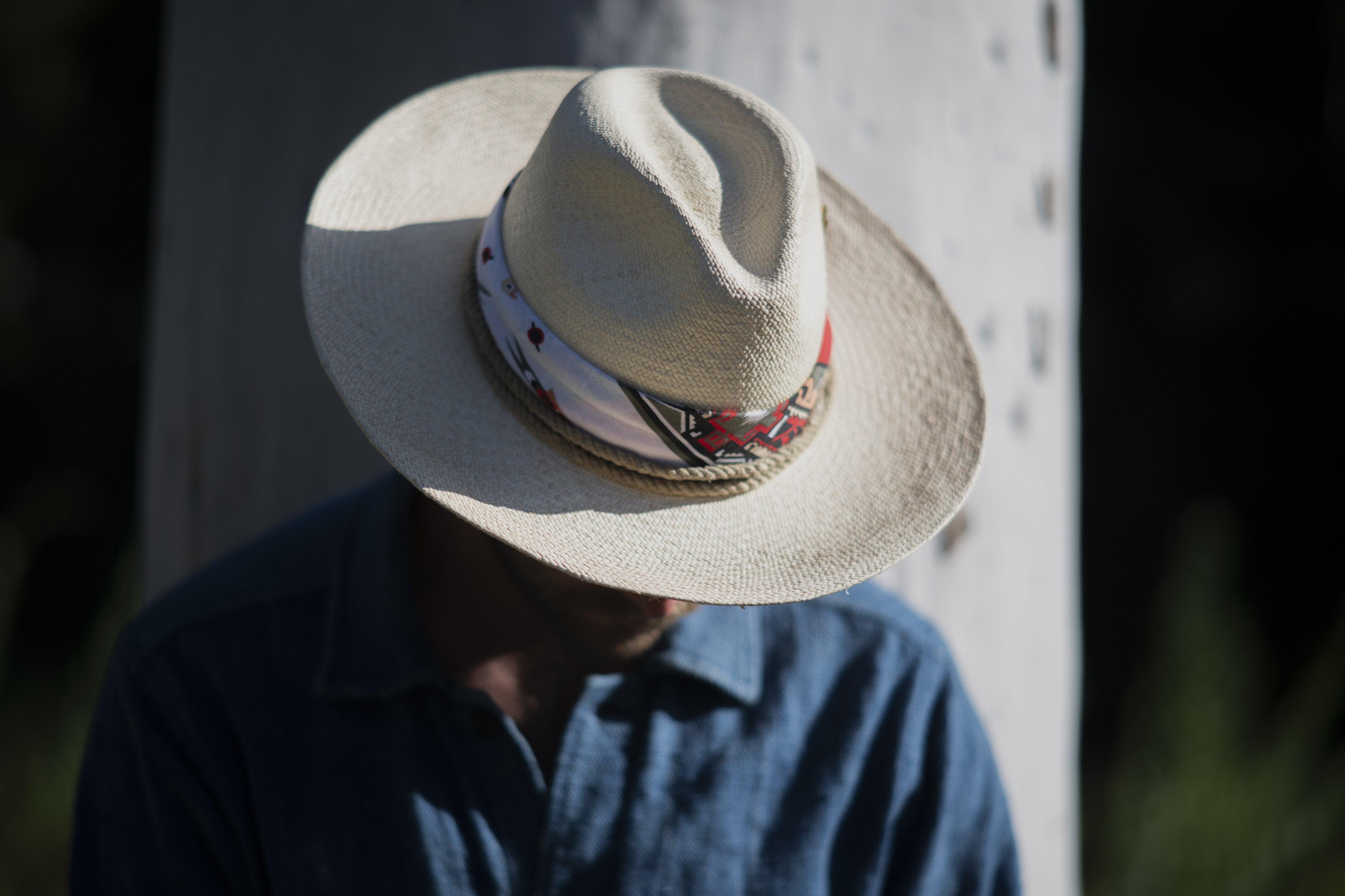 Firebird hat worn by model, front view, Hampui Hats.