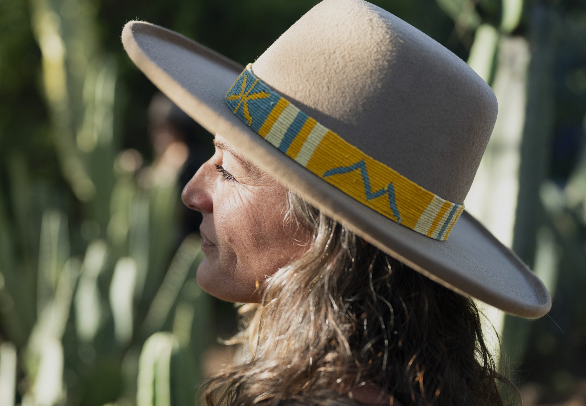 Sonora Daybreak hand-woven Guatemalan band detail in ochre, teal, and bone with tight geometric weave.