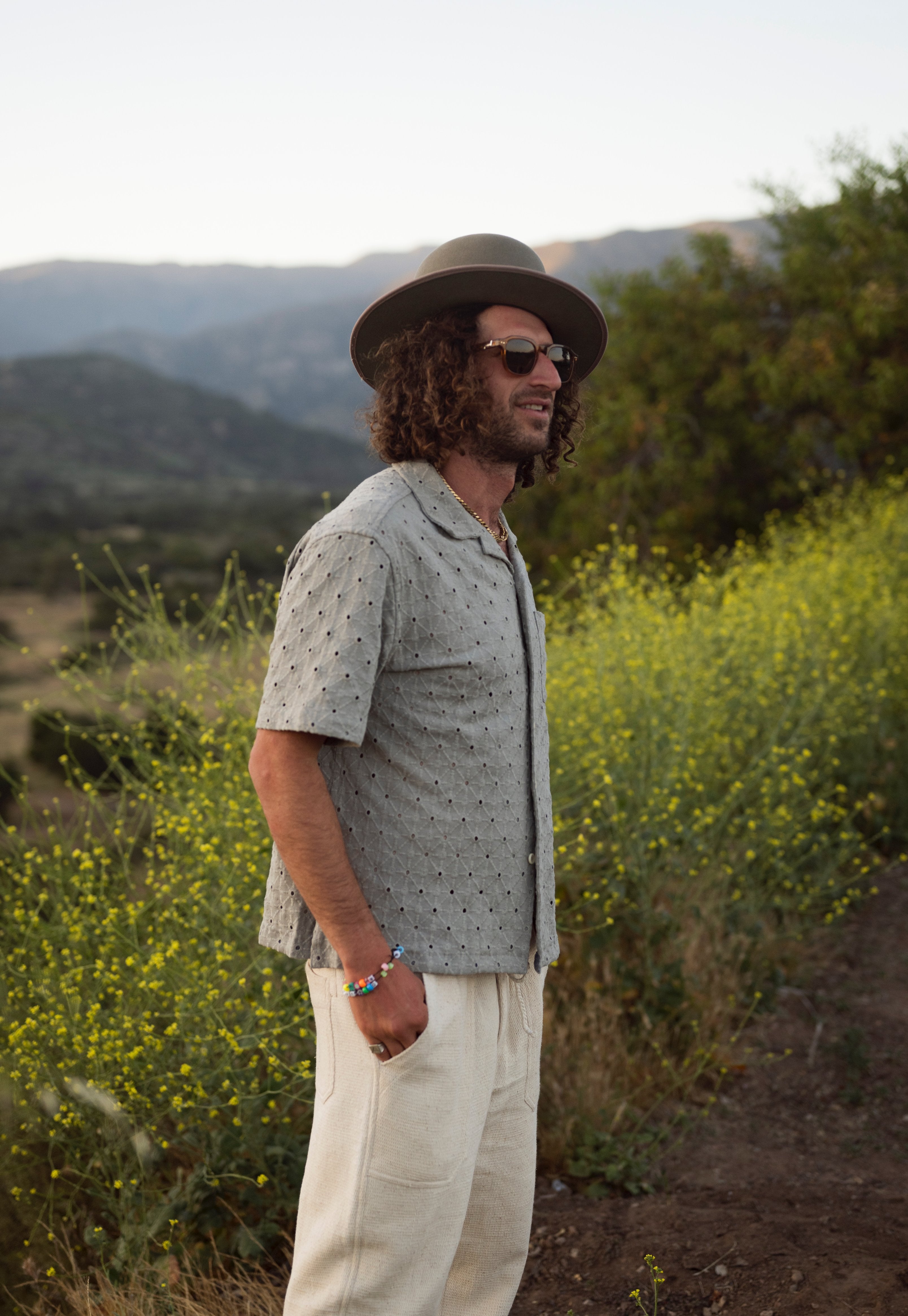 Sweet Grass hat styled outdoors, lifestyle setting.