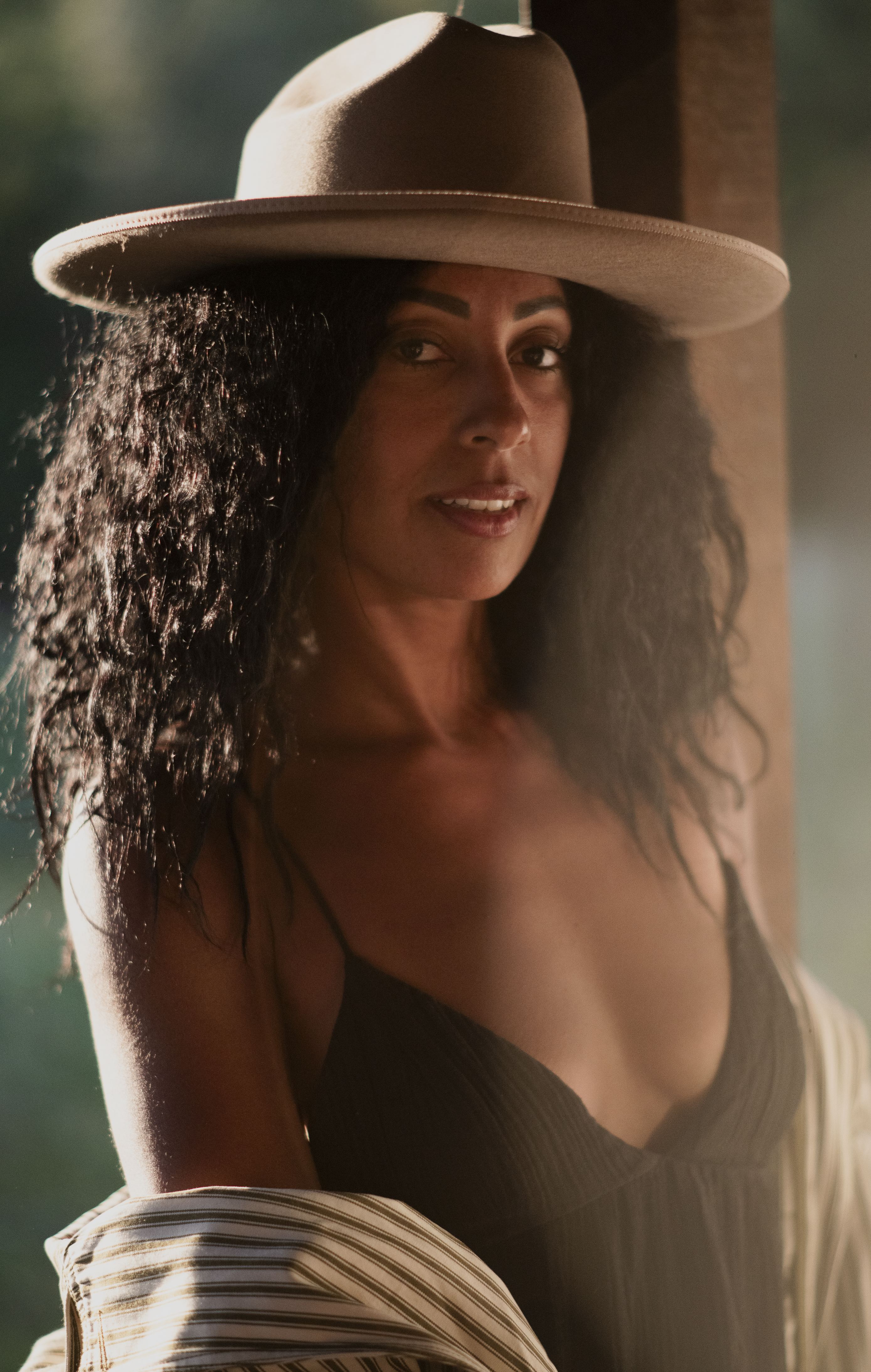 Warmspell hat worn in a second lifestyle setting, alternate angle.