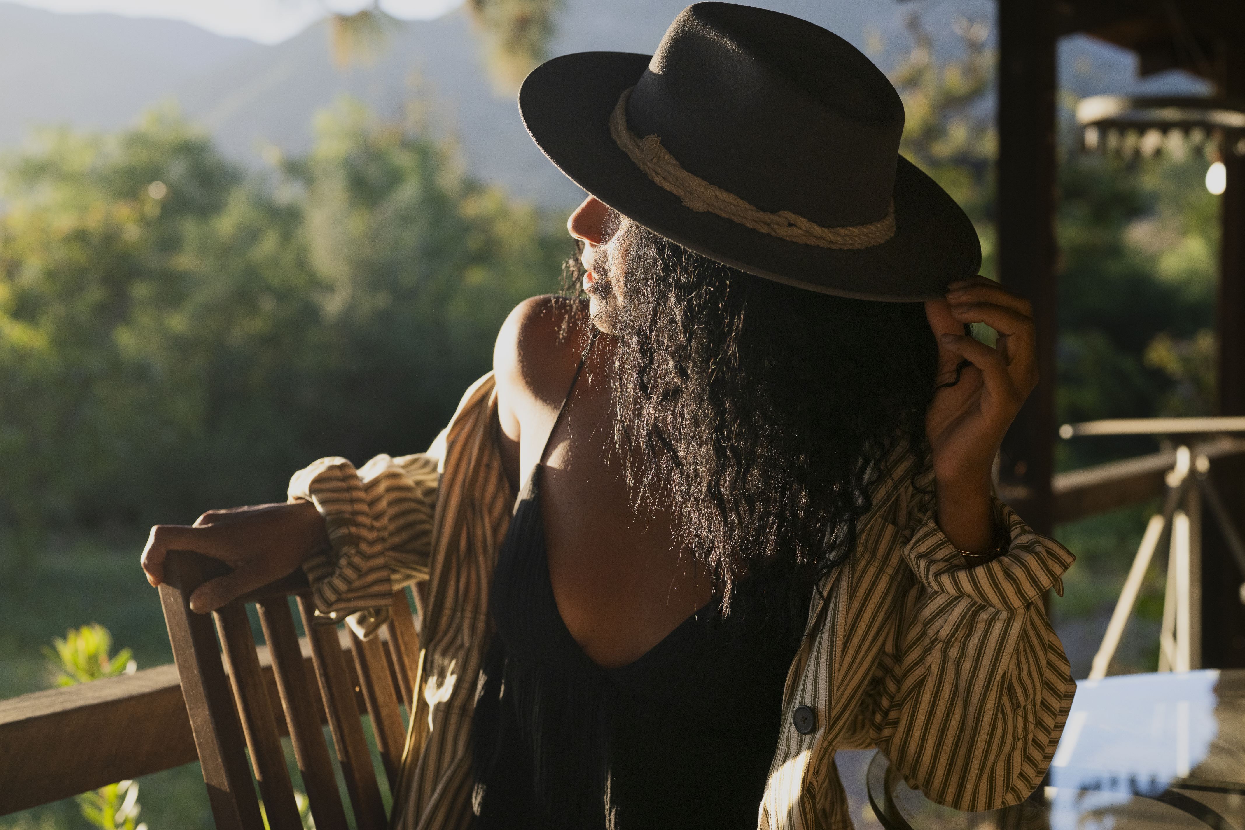 Worst Comes to Worst hat styled outdoors, lifestyle setting.